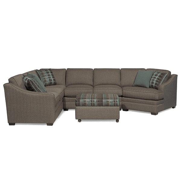 Dark grey, upholstered, 6 cushion sectional with curve track arm rests and square ottoman.