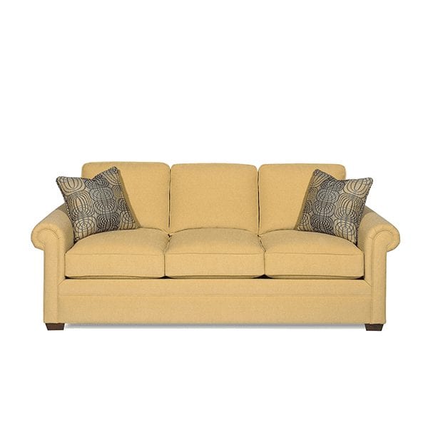 Yellow, upholstered, 3 cushion sofa with classic track, rounded arm rests.