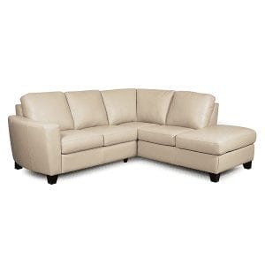 Beige, leather, 5 cushion sectional with subtle curved arms and chaise on right side.