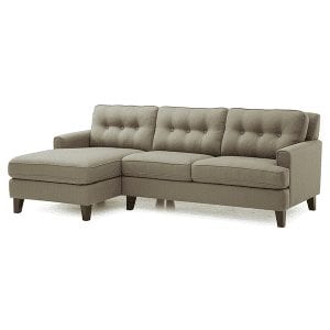 Grey, upholstered, 3 cushion tufted back sofa with squared arm rests and chaise on left side .