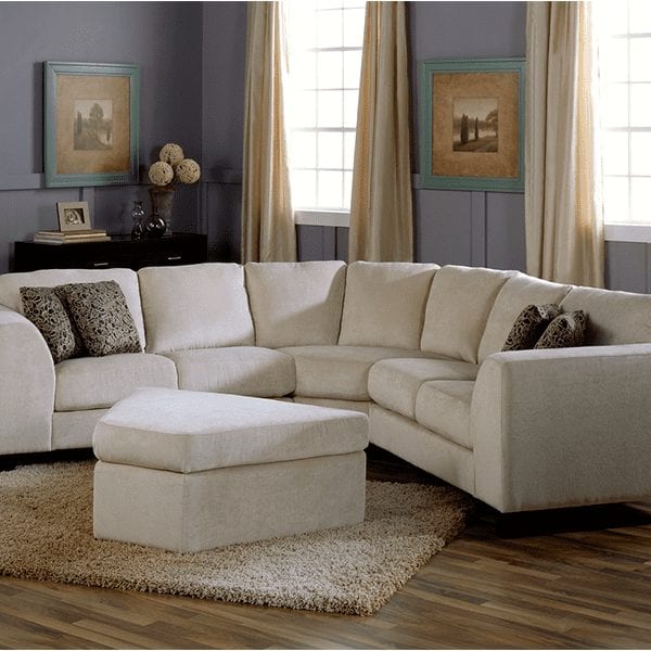 White, upholstered, 5 seat sectional with subtle curved arms.